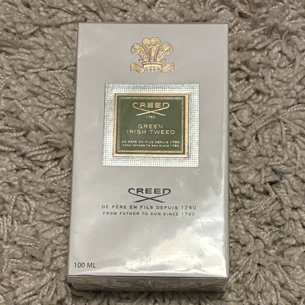 Creed Fragrance with Gold and Cream Packaging